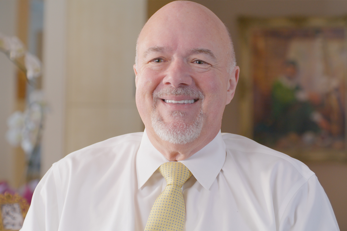 A man smiling after multpiple dental implants in Los Angeles.