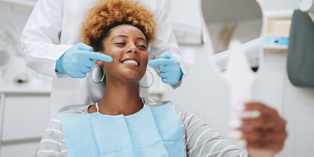 woman getting a routine teeth cleaning in Los Angeles, CA